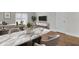 Dining room with a marble table and views of the living room at 402 Andrea Ln, Hanahan, SC 29410