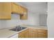 Functional kitchen featuring wooden cabinets and a stainless steel sink at 402 Andrea Ln, Hanahan, SC 29410