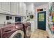 Functional laundry room with front load washer and dryer and ample storage space at 4057 E Amy Ln, Johns Island, SC 29455