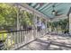 Relaxing screened porch features a ceiling fan, outdoor furniture, and a view of the backyard at 4057 E Amy Ln, Johns Island, SC 29455