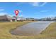Home with a backyard overlooking a peaceful pond, marked with a location pin at 415 Ribiero Dr, Summerville, SC 29486