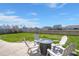 Cozy backyard with a fire pit and patio furniture, great for enjoying evenings outdoors at 415 Ribiero Dr, Summerville, SC 29486