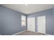Neutral bedroom features a closet for storage and natural light at 415 Ribiero Dr, Summerville, SC 29486