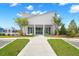 Beautiful clubhouse featuring modern architectural details, manicured landscaping, and a welcoming entrance at 415 Ribiero Dr, Summerville, SC 29486