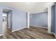 Inviting living room with hardwood floors, neutral paint, and a bright window at 415 Ribiero Dr, Summerville, SC 29486
