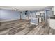 Open floor plan showcasing living room and kitchen with stairs to the upper level at 415 Ribiero Dr, Summerville, SC 29486