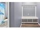 Mudroom features storage bench and adjoins a full bathroom at 415 Ribiero Dr, Summerville, SC 29486