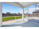 A screened porch with furniture and a view of the fenced yard at 415 Ribiero Dr, Summerville, SC 29486