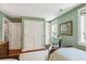 Cozy bedroom features a large closet and neutral colors at 42 Barre St, Charleston, SC 29401