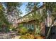 Beautiful two-story brick home with green shutters and mature landscaping at 42 Barre St, Charleston, SC 29401