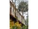 Charming brick building with light shutters and tree at 42 Barre St, Charleston, SC 29401