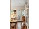 Hallway with hardwood floors, wallpaper, and a view through French doors to another room at 42 Barre St, Charleston, SC 29401