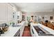 Open-concept kitchen with island cooktop, stylish countertops, and lots of natural light at 42 Barre St, Charleston, SC 29401