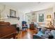 Home office with hardwood floors, a fireplace, and ample seating at 42 Barre St, Charleston, SC 29401