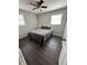Bedroom featuring modern ceiling fan and dark hardwood floors at 4451 Donwood Dr, Ladson, SC 29456
