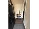 A home's entryway showcases a stylish table with decor and wood flooring at 4451 Donwood Dr, Ladson, SC 29456
