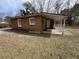 Charming brick home with a covered patio and a well-maintained exterior at 4451 Donwood Dr, Ladson, SC 29456