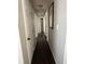 Hallway featuring doors and dark hardwood flooring at 4451 Donwood Dr, Ladson, SC 29456