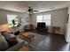 Bright living room with modern decor featuring hardwood floors and a ceiling fan at 4451 Donwood Dr, Ladson, SC 29456