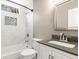 Bathroom featuring a modern vanity, subway tiled shower, and stylish fixtures at 4788 Porter Dr, North Charleston, SC 29420