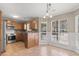 Bright eat-in kitchen featuring stainless steel appliances and mosaic tile backsplash at 4788 Porter Dr, North Charleston, SC 29420