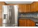 Modern kitchen with stainless steel refrigerator and updated countertops at 4788 Porter Dr, North Charleston, SC 29420