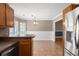 Bright eat-in kitchen featuring stainless steel appliances and mosaic tile backsplash at 4788 Porter Dr, North Charleston, SC 29420