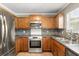 Well-equipped kitchen features stainless steel appliances and tile backsplash at 4788 Porter Dr, North Charleston, SC 29420