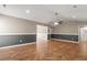 Bright living room with herringbone floors, and a fan at 4788 Porter Dr, North Charleston, SC 29420