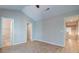 Bedroom showing bathroom access, closet access, and light wood-look flooring at 546 Tayrn Dr, Charleston, SC 29492