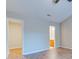 Spacious bedroom featuring ensuite bathroom, carpeted floor and a large window at 546 Tayrn Dr, Charleston, SC 29492