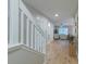 Inviting entryway with wood floors, white trim and neutral walls offers an open view of the living spaces at 546 Tayrn Dr, Charleston, SC 29492