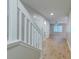 Inviting entryway with wood floors, white trim and neutral walls offers an open view of the living spaces at 546 Tayrn Dr, Charleston, SC 29492