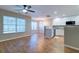 The living room boasts lots of natural light, modern appliances, and open access to the kitchen at 546 Tayrn Dr, Charleston, SC 29492