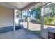 View of screened porch with concrete flooring and a view of the backyard and trees at 546 Tayrn Dr, Charleston, SC 29492