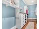 Walk-in closet with built-in shelving, drawers, and bench seating at 57 Goldenrod Ct, Kiawah Island, SC 29455