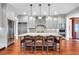 Spacious gourmet kitchen with large island, stainless steel appliances, and custom cabinets at 57 Goldenrod Ct, Kiawah Island, SC 29455