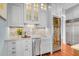Charming kitchenette features sleek countertops, stainless steel appliances, and custom cabinetry at 57 Goldenrod Ct, Kiawah Island, SC 29455