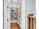 Walk-in pantry with custom shelving and storage at 57 Goldenrod Ct, Kiawah Island, SC 29455