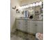 Spacious bathroom featuring double vanity sinks, granite countertops, and ample storage space at 5911 Steward St # 7, Hanahan, SC 29410