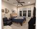 Cozy bedroom with a comfortable bed, accent chair, and ample natural light at 5911 Steward St # 7, Hanahan, SC 29410