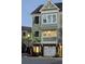 Charming two-story townhome with a one-car garage and welcoming front entrance at 5911 Steward St # 7, Hanahan, SC 29410
