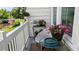 Charming patio with bright flowers, garden decor, and scenic views for relaxation at 5911 Steward St # 7, Hanahan, SC 29410