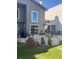 Landscaped backyard with brick patio, BBQ grill and outdoor seating at 604 Ventura Pl, Mount Pleasant, SC 29464