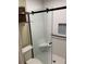 Modern bathroom features a glass shower with white subway tile and built-in seat at 604 Ventura Pl, Mount Pleasant, SC 29464