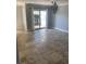 Bright dining room featuring tile floors, sliding glass doors and elegant chandelier at 604 Ventura Pl, Mount Pleasant, SC 29464