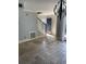 Entryway with beautiful tile floors, wooden staircase and exterior view at 604 Ventura Pl, Mount Pleasant, SC 29464