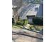 Inviting gray home with manicured front yard landscaping and walkway at 604 Ventura Pl, Mount Pleasant, SC 29464