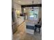 Modern kitchen with stainless steel appliances, island seating and backyard view at 604 Ventura Pl, Mount Pleasant, SC 29464