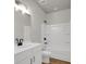 Bright bathroom featuring a white vanity, modern fixtures, and a tub-shower combo, perfect for a clean, modern look at 5206 Cottage Lndg Dr, Summerville, SC 29485